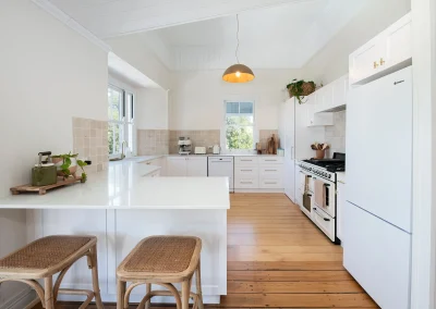 White country-style kitchen in North Maleny Country Cottage