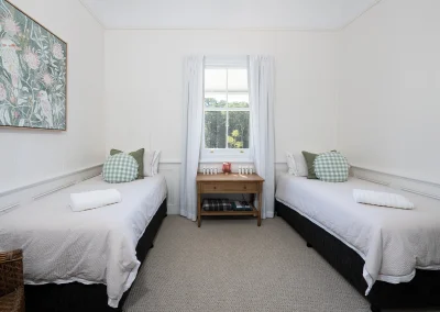 two single beds in one bedroom in North Maleny Country Cottage